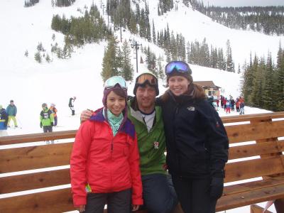 three students on deck at ski area